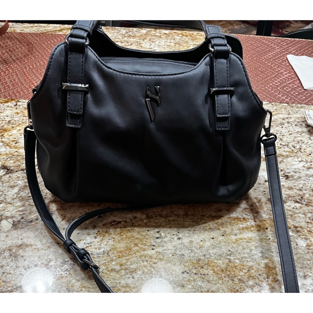 Used gently Vera Wang handbag.